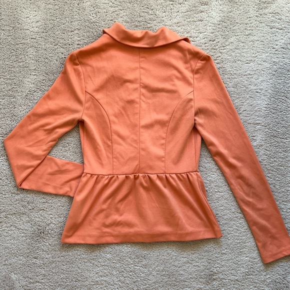 Peach colored peplum style blsxer - Picture 3 of 4
